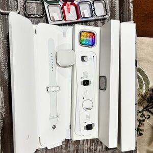 Series 8 Apple Watch. Silver aluminum case white sport band. 45 mm.